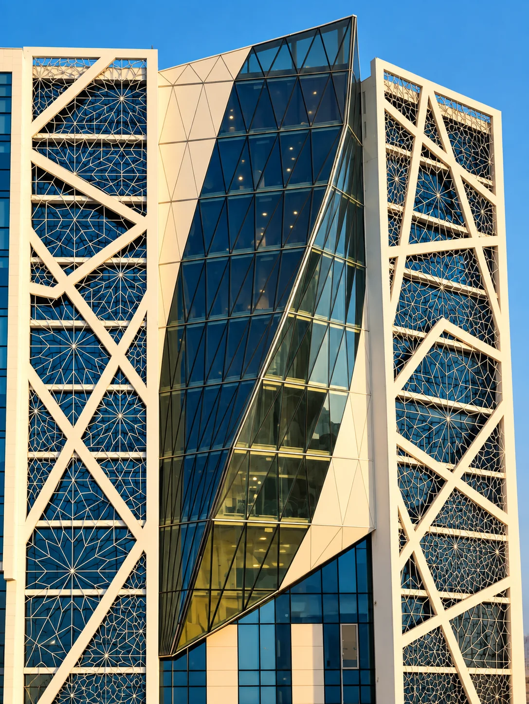 iTower’s glazed central facade with patterned mashrabiya screens